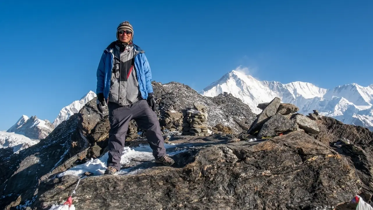 Trekking Guide standing at the top of Gokyo Ri