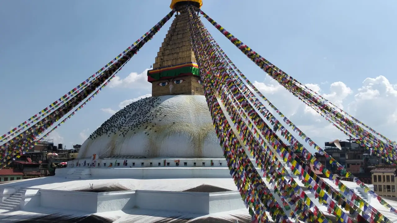 Boudhanath Stupa Kathmandu Nepal — iconic white dome and Buddha eyes