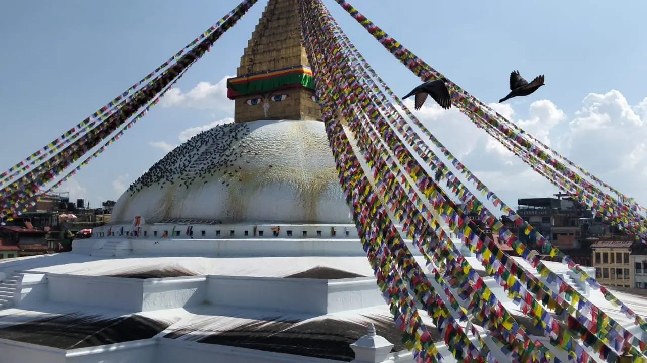Boudhanath Stupa close detail — gold-plated harmika and spire ornaments