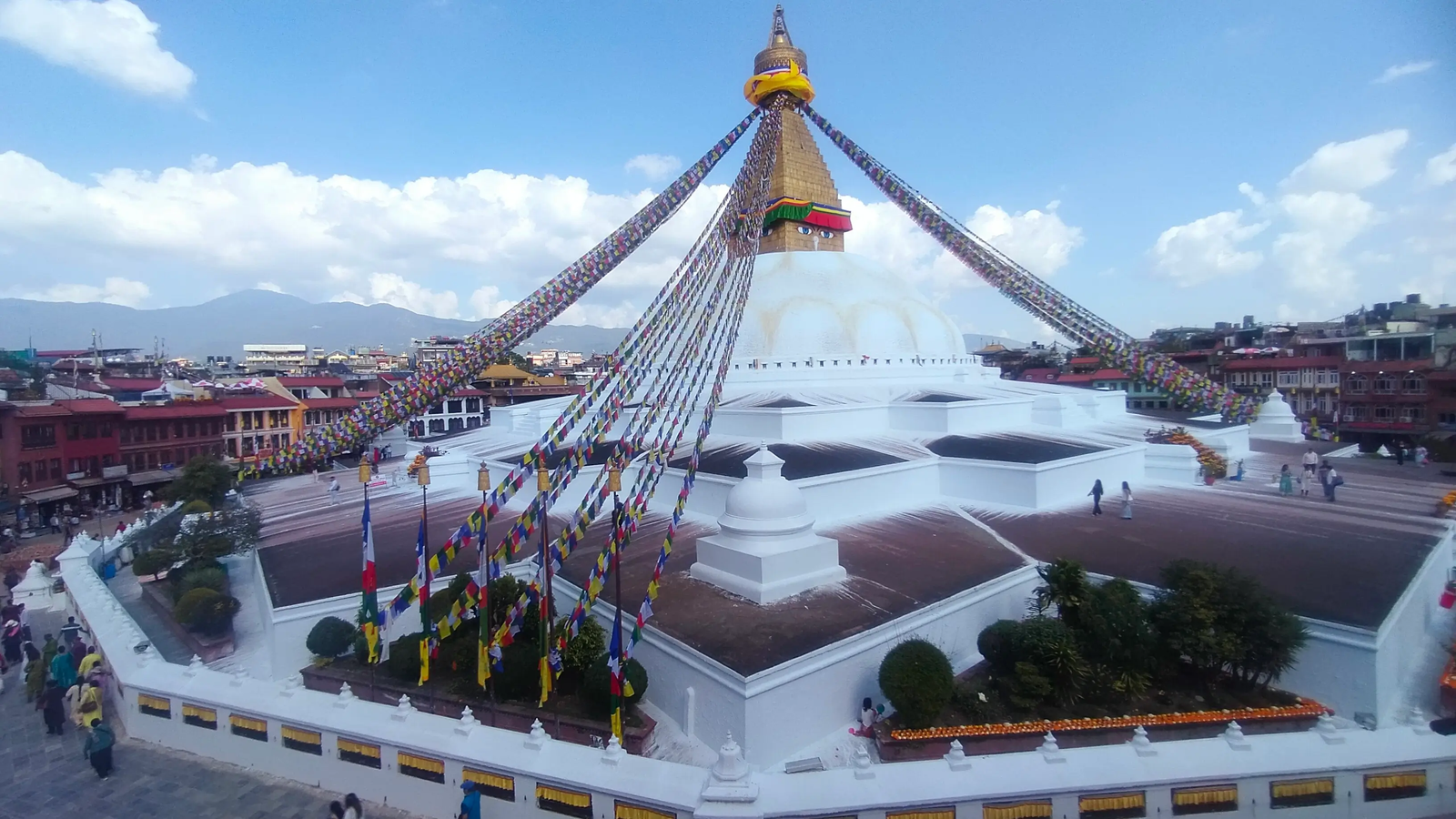 Boudhanath Stupa closeup — painted eyes of Buddha and gilded spire