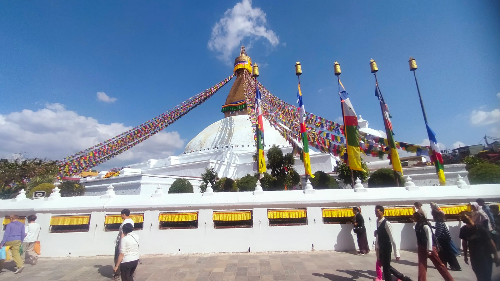 Boudhanath Stupa monastery and prayer flags — Tibetan Buddhist center