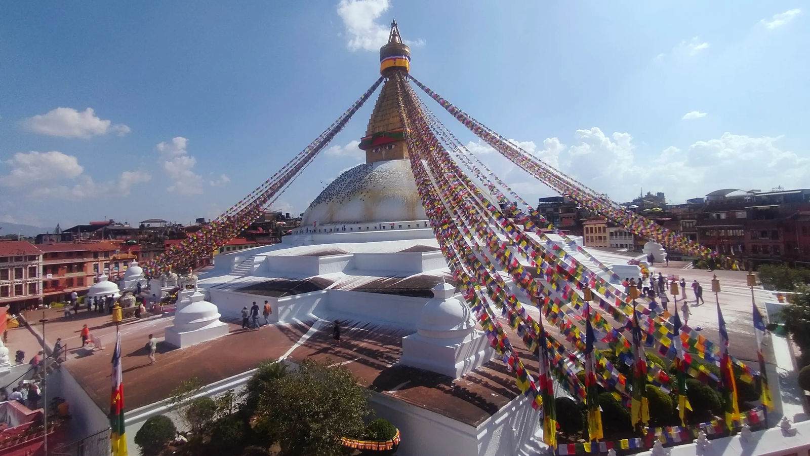 Boudhanath Stupa street vendors and souvenir shops nearby