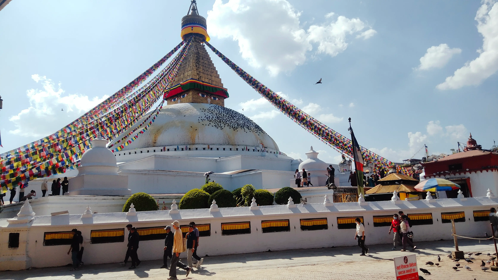 Boudhanath Stupa with Himalayan backdrop — cultural travel photo Nepal
