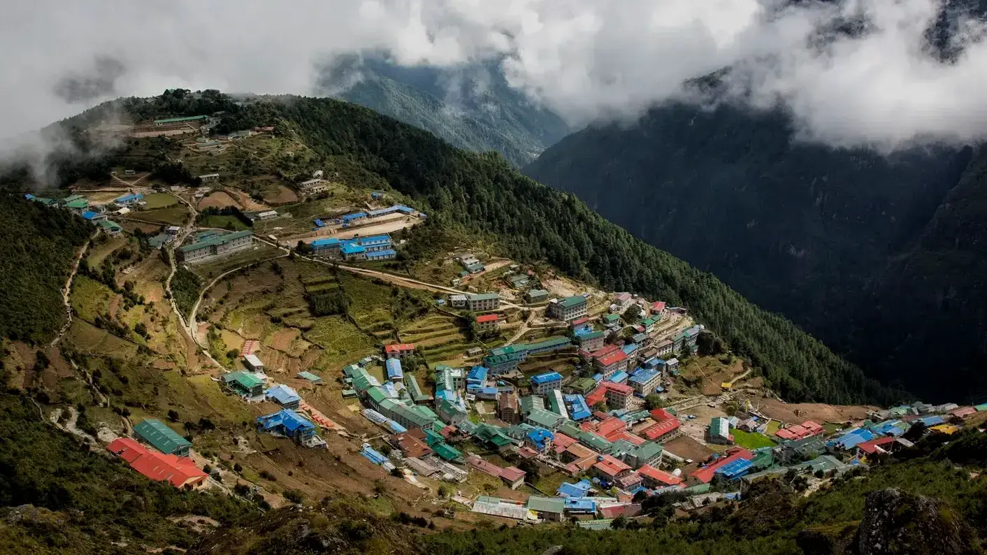 Namche Bazaar on the Everest Base Camp Trek in Nepal with stunning Himalayan mountain views, Sherpa village culture, colorful lodges, scenic trekking trails, and breathtaking landscapes in the Everest Khumbu region.