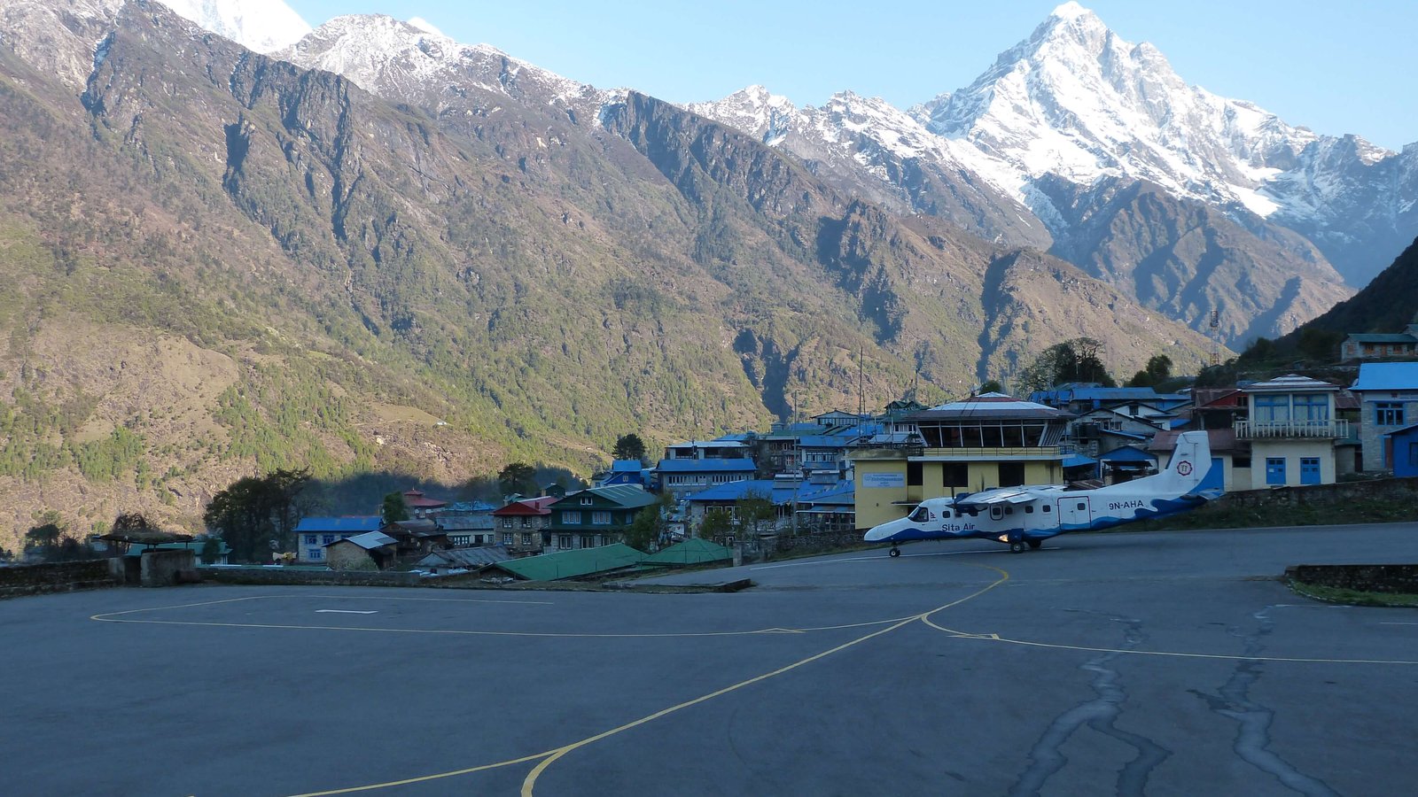 Tenzing-Hillary Airport in Lukla with a short mountain runway surrounded by steep Himalayan terrain