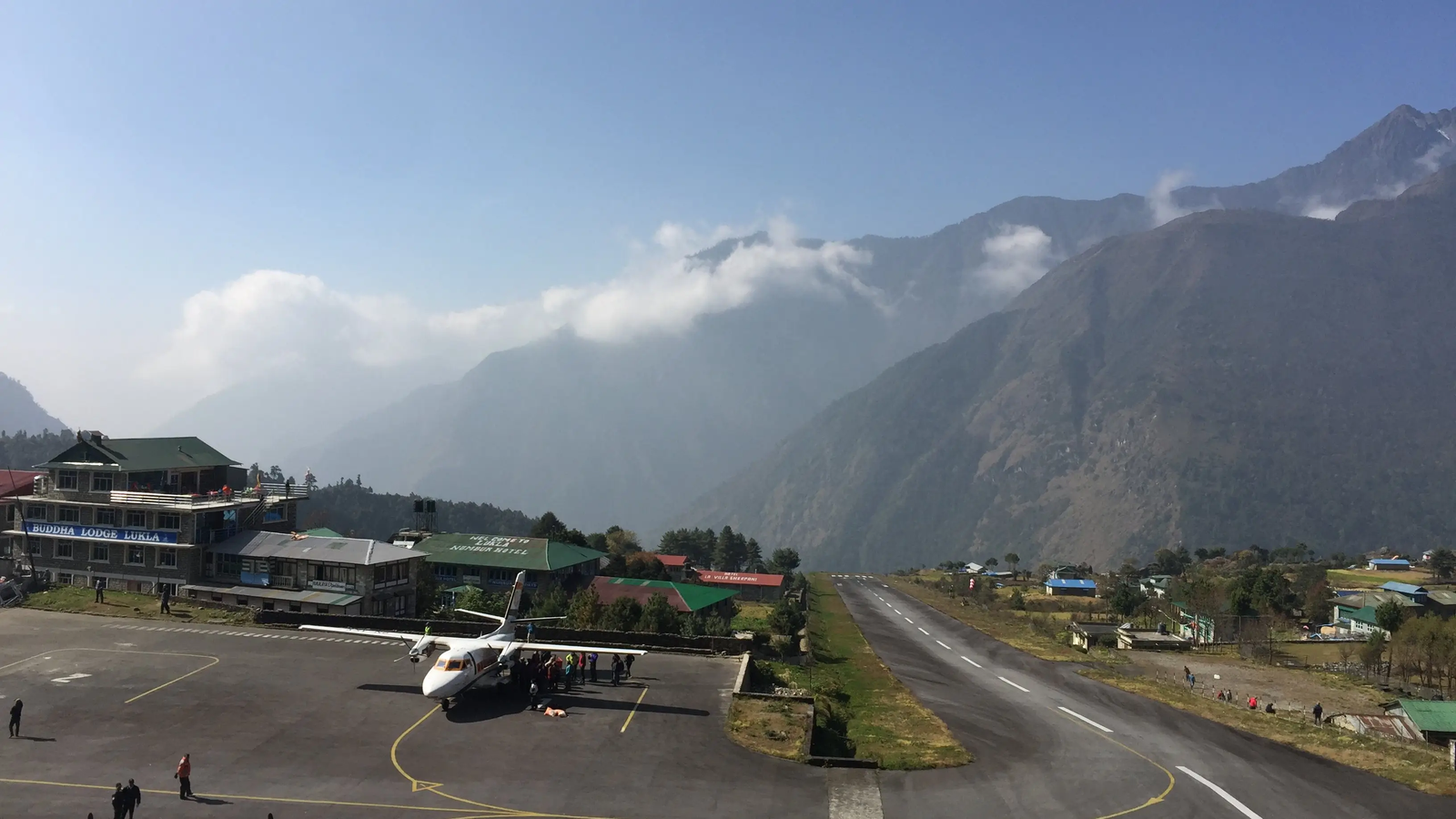Tenzing-Hillary Airport in Lukla with its short mountain runway and steep Himalayan mountains surrounding it