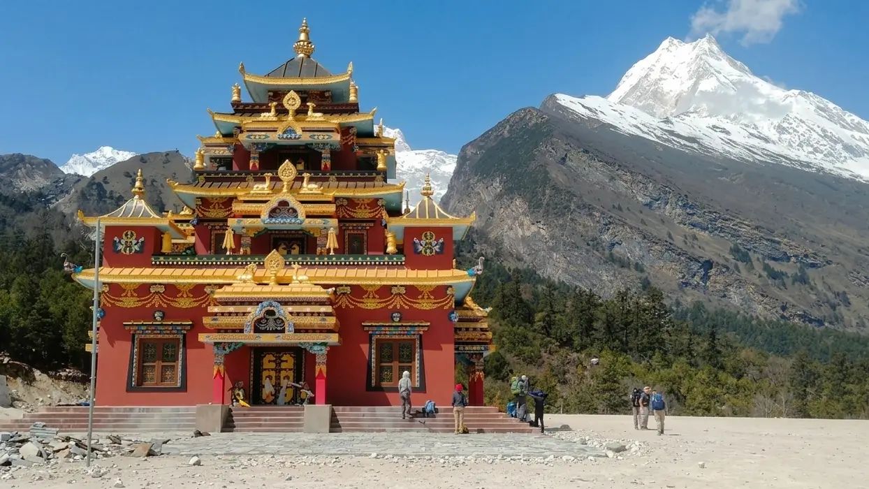 View of the Buddhist monastery & mountains from Syala on the Manaslu Circuit Trek